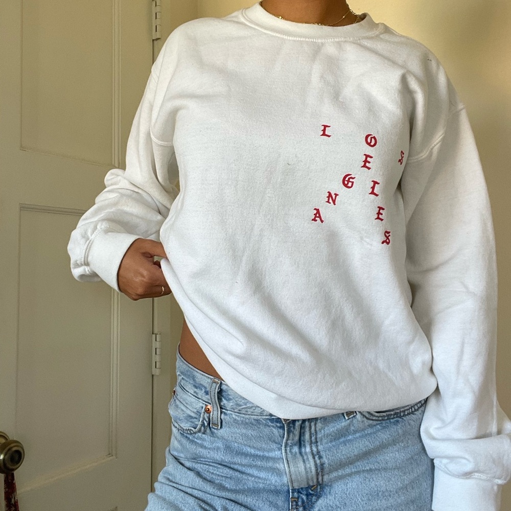 White crewneck sweatshirt Los Angeles and “No More Parties in LA”